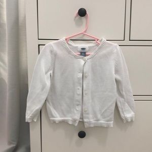 White button down sweater.